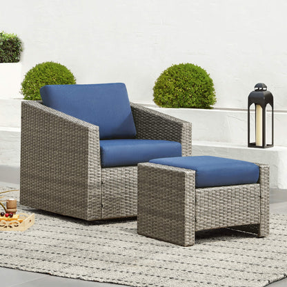 Calum Rattan outdoor chair and ottoman with navy cushions for stylish patio relaxation - CHITA Living
