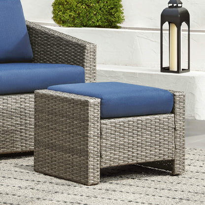 Calum Rattan outdoor ottoman with navy cushion and textured weave for stylish comfort - CHITA Living
