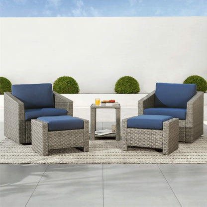 Calum Rattan outdoor 5-piece patio set with navy cushions and glass-top table for relaxation - CHITA Living