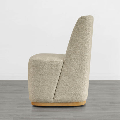 Beige textured wingback dining chair with curved wooden base in modern minimalist room - CHITA Living