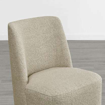 Beige textured wingback chair with a smooth curved design in a modern interior - CHITA Living
