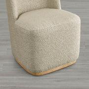 Beige textured wingback chair with curved wooden base in modern interior - CHITA Living