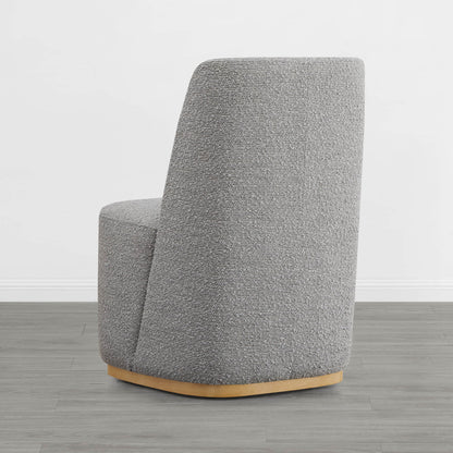 Curved gray wingback dining chair with wooden base in minimalist room - CHITA Living