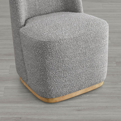 Close-up of gray wingback chair with curved wooden base and textured upholstery - CHITA Living