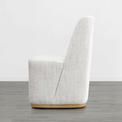 Beige wingback chair with curved design and wooden base in modern interior - CHITA Living