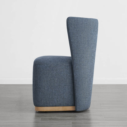 Blue upholstered wingback dining chair with a stylish curved wooden base - CHITA Living