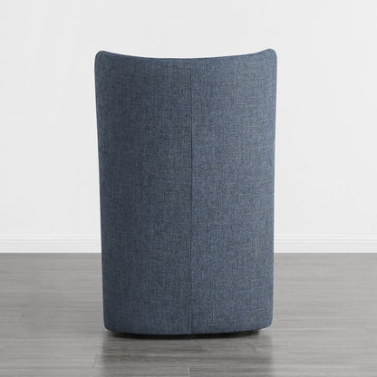 Back view of a modern blue wingback chair with a curved design in a bright room - CHITA Living