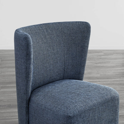 Stylish blue wingback dining chair with a curved back and textured upholstery - CHITA Living