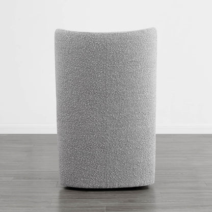Back view of a soothing gray boucle upholstered wingback chair in a minimalist setting - CHITA Living