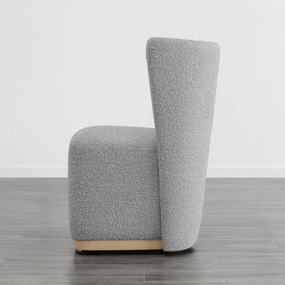 Side view of modern gray wingback dining chair with textured upholstery and curved design - CHITA Living