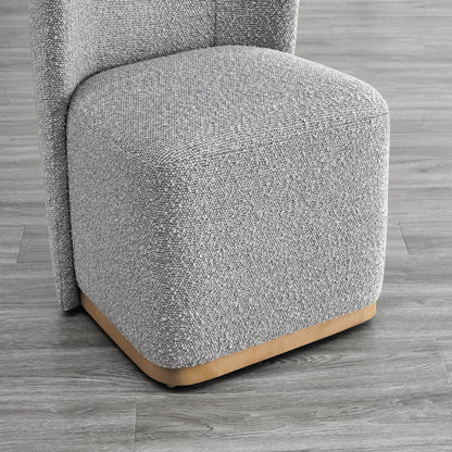 Close-up of gray textured dining chair base with curved wood accent - CHITA Living