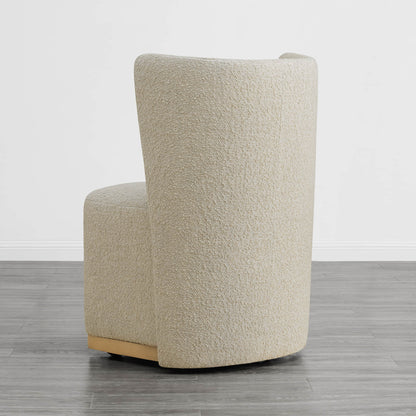 Beige textured wingback chair with curved design in a minimalist setting - CHITA Living