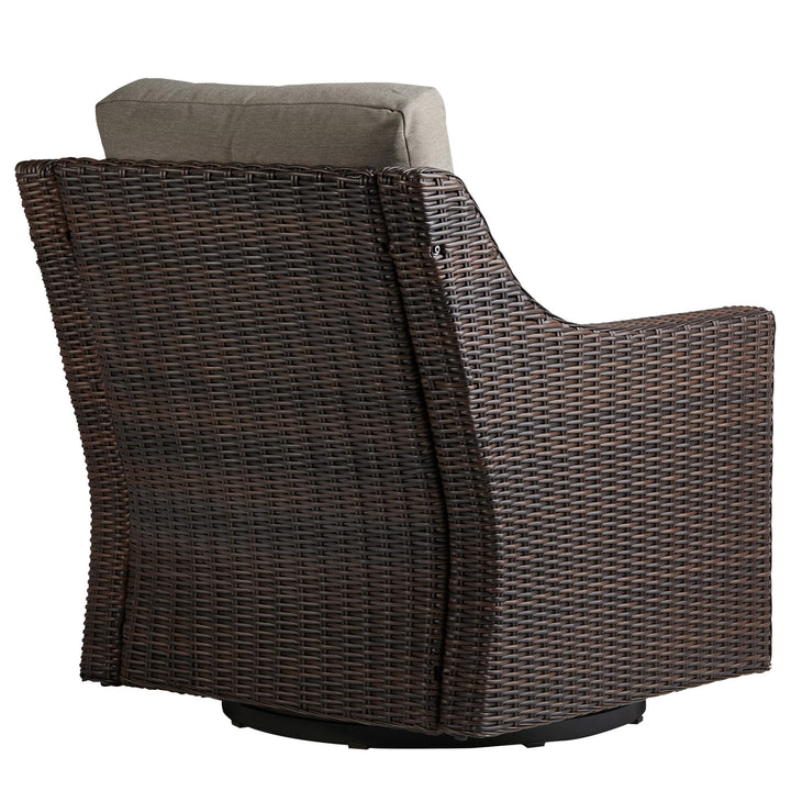 Elara rattan lounge chair with gray cushion in contemporary outdoor setting - CHITA Living
