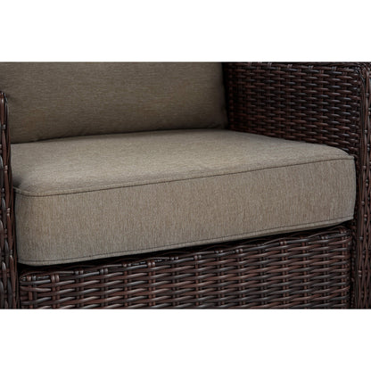 Elara Rattan Chair with brown cushion, featuring woven wicker texture for outdoor seating - CHITA Living