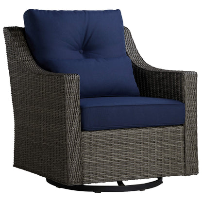 Elara rattan outdoor rocking swivel chair with plush navy cushion for stylish patios - CHITA Living