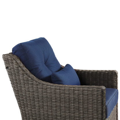 Elara Rattan Chair with navy cushion, showcasing woven wicker design for outdoor comfort - CHITA Living