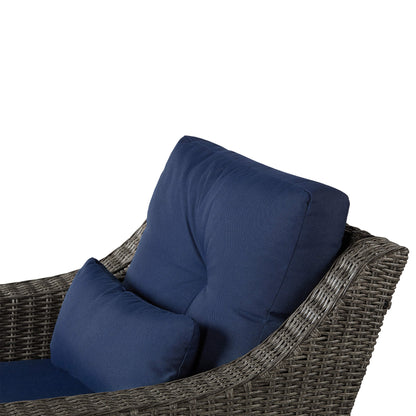 Close-up of Elara rattan outdoor rocking swivel chair with navy cushions and woven detail - CHITA Living