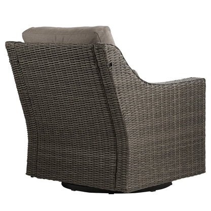 Gray rattan swivel lounge chair with plush gray cushion for outdoor comfort - CHITA Living