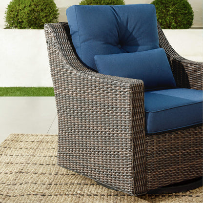 Elara outdoor rocking swivel chair with plush blue cushions, perfect for stylish patios - CHITA Living