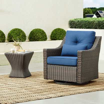 Stylish Elara Rattan Bistro Set with blue cushions and a round side table on patio - CHITA Living