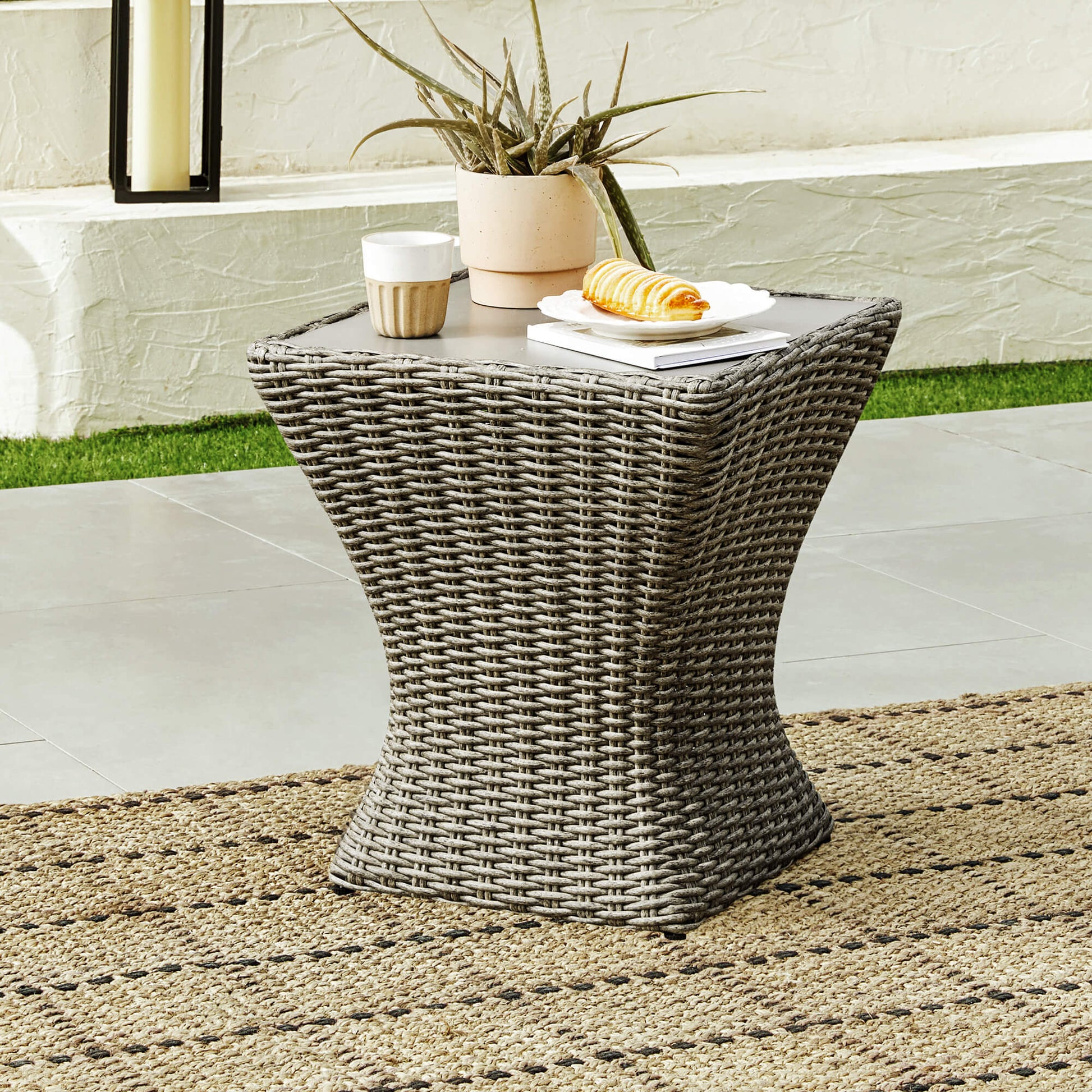 Woven rattan accent table suitable for patio settings with smooth tabletop - CHITA Living
