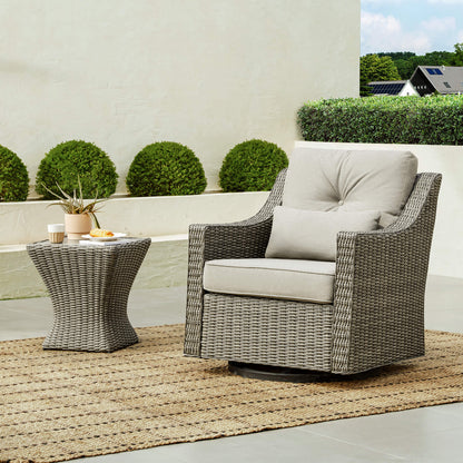 Elara Rattan Outdoor Chair with gray cushions and woven side table, perfect for patios - CHITA Living