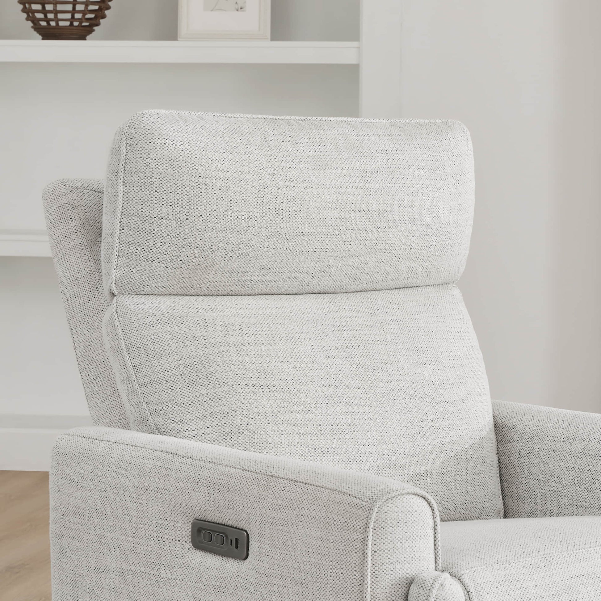 Close-up of adjustable headrest on Elysian Power Swivel Glider Recliner in light fabric - CHITA Living