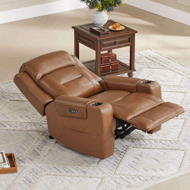 A wall-hugging recliner with built-in cup holders and a power headrest, placed next to a wooden side table.