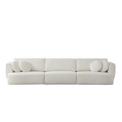 Grace 3-Seat Modular Curved Sofa in light fabric with round cushions in modern living room - CHITA Living
