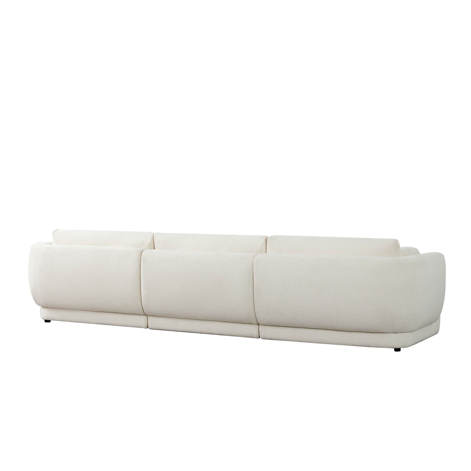 Rear view of Grace 3-Seat Modular Curved Sofa in light boucle fabric - CHITA Living