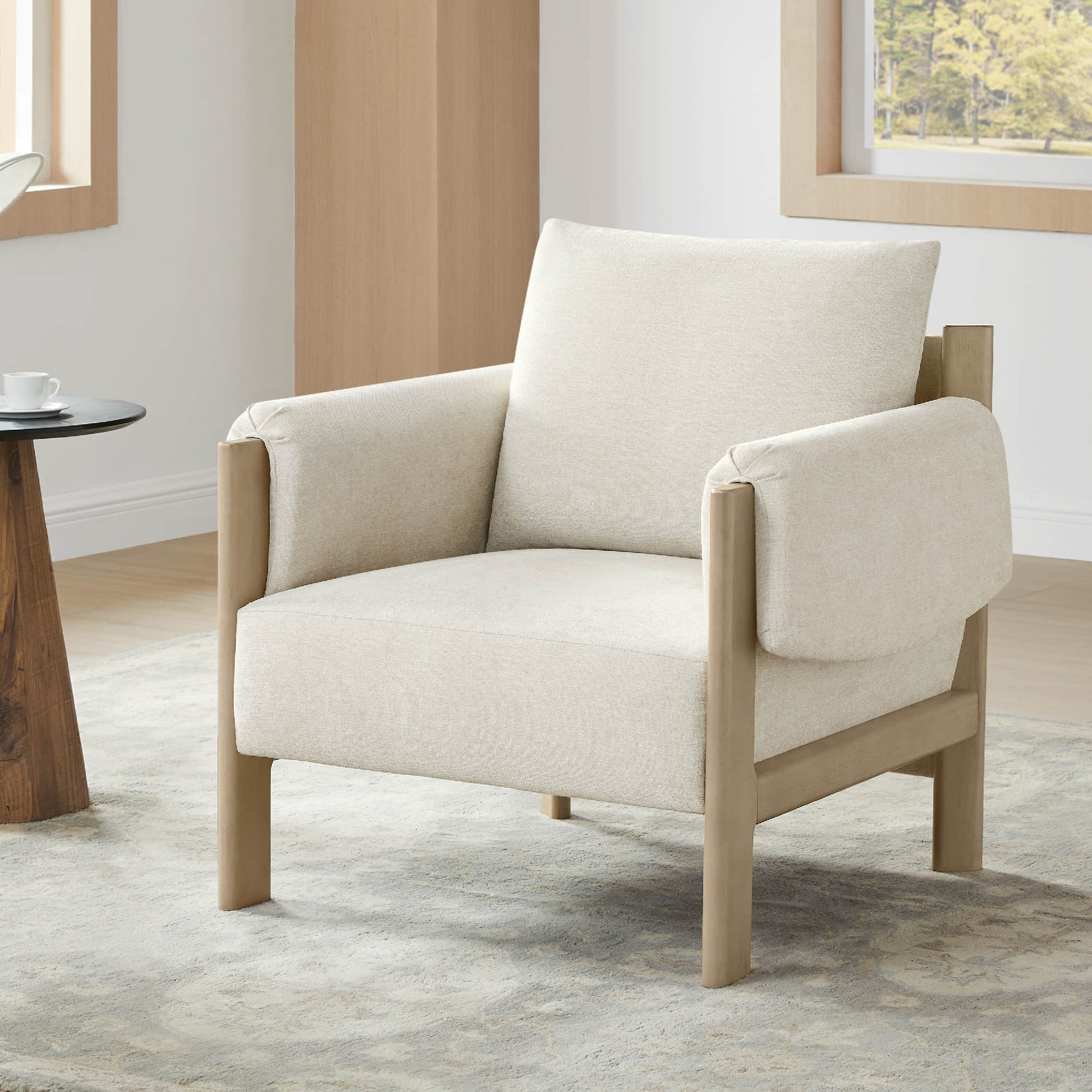 Harbor Accent Chair, a harmony of wood and soft upholstery, in a bright living room with natural light.