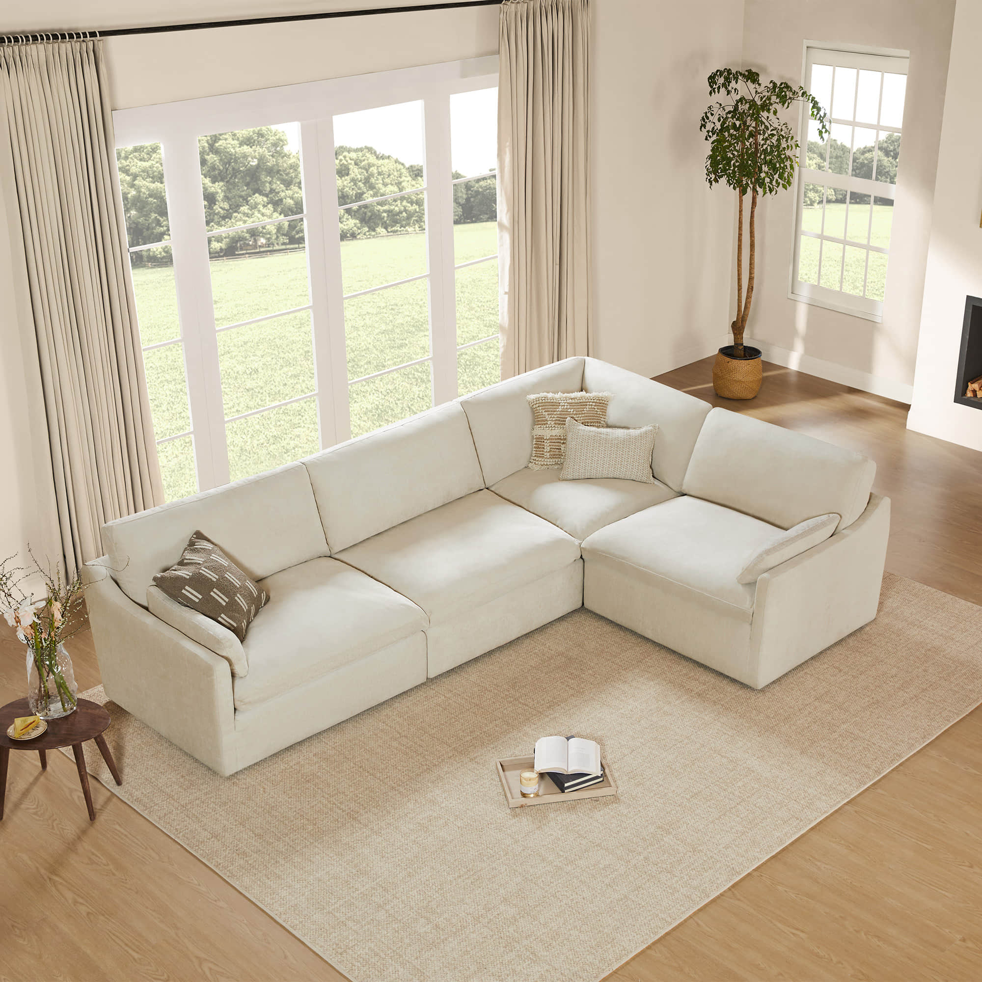 Kenna Modular 4 Seat Sofa-Chaise Sectional in cream, spacious living room with natural light, comfortable seating