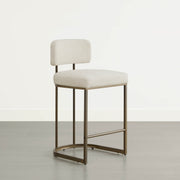 Side profile: tall cream kitchen barstool, minimalist design.