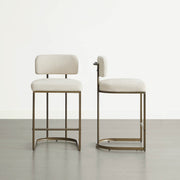 Two cream kitchen barstools, counter & bar height options shown.