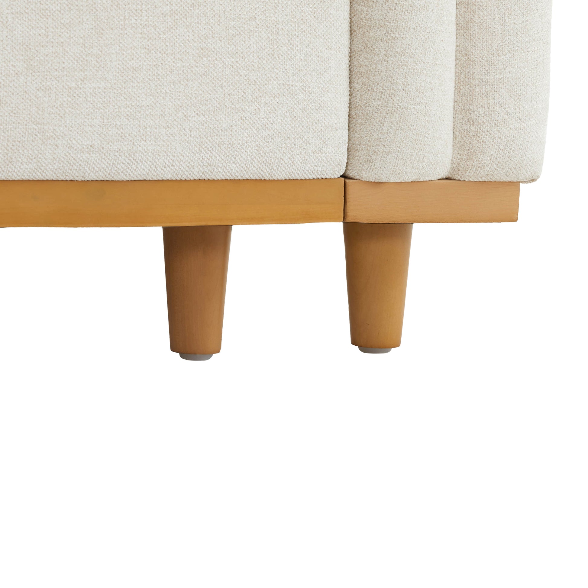 Close-up of Liam sectional sofa's wooden legs and base in light fabric - CHITA Living