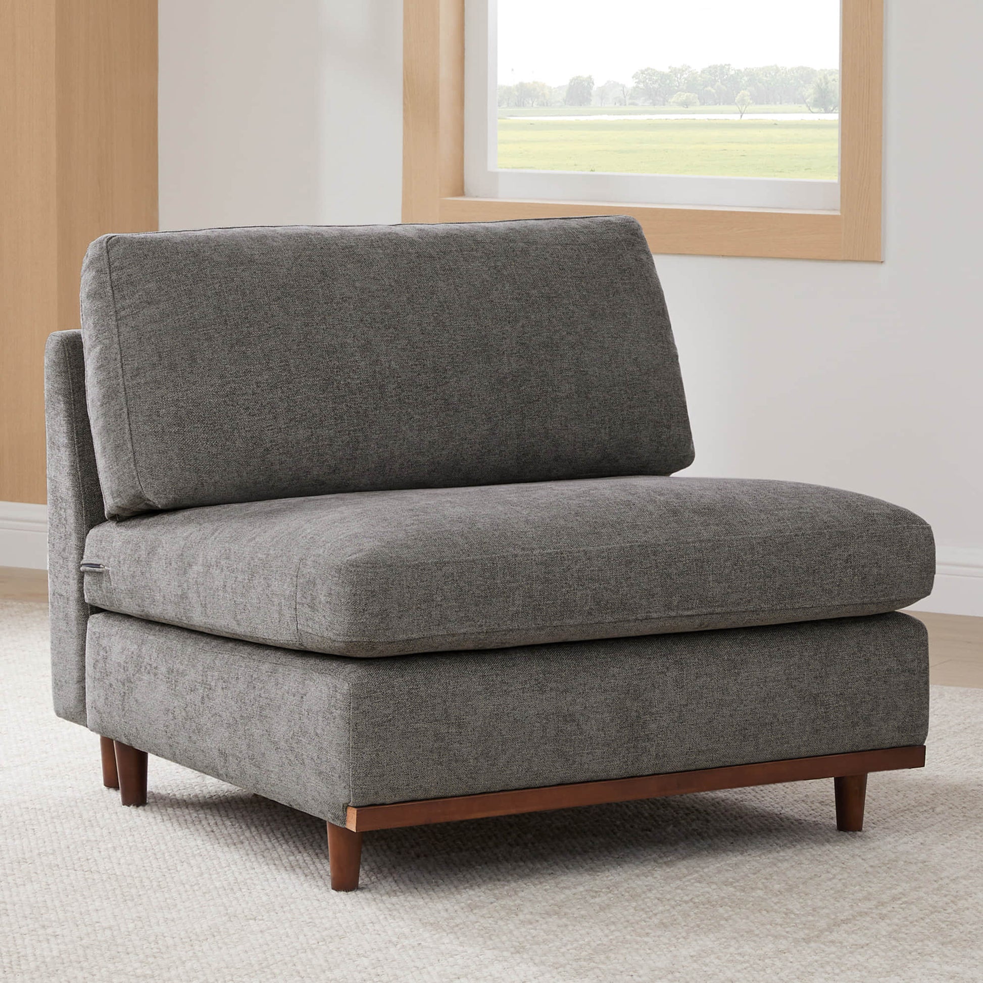 Liam modular sectional chaise in gray fabric with wooden legs in modern living room - CHITA Living