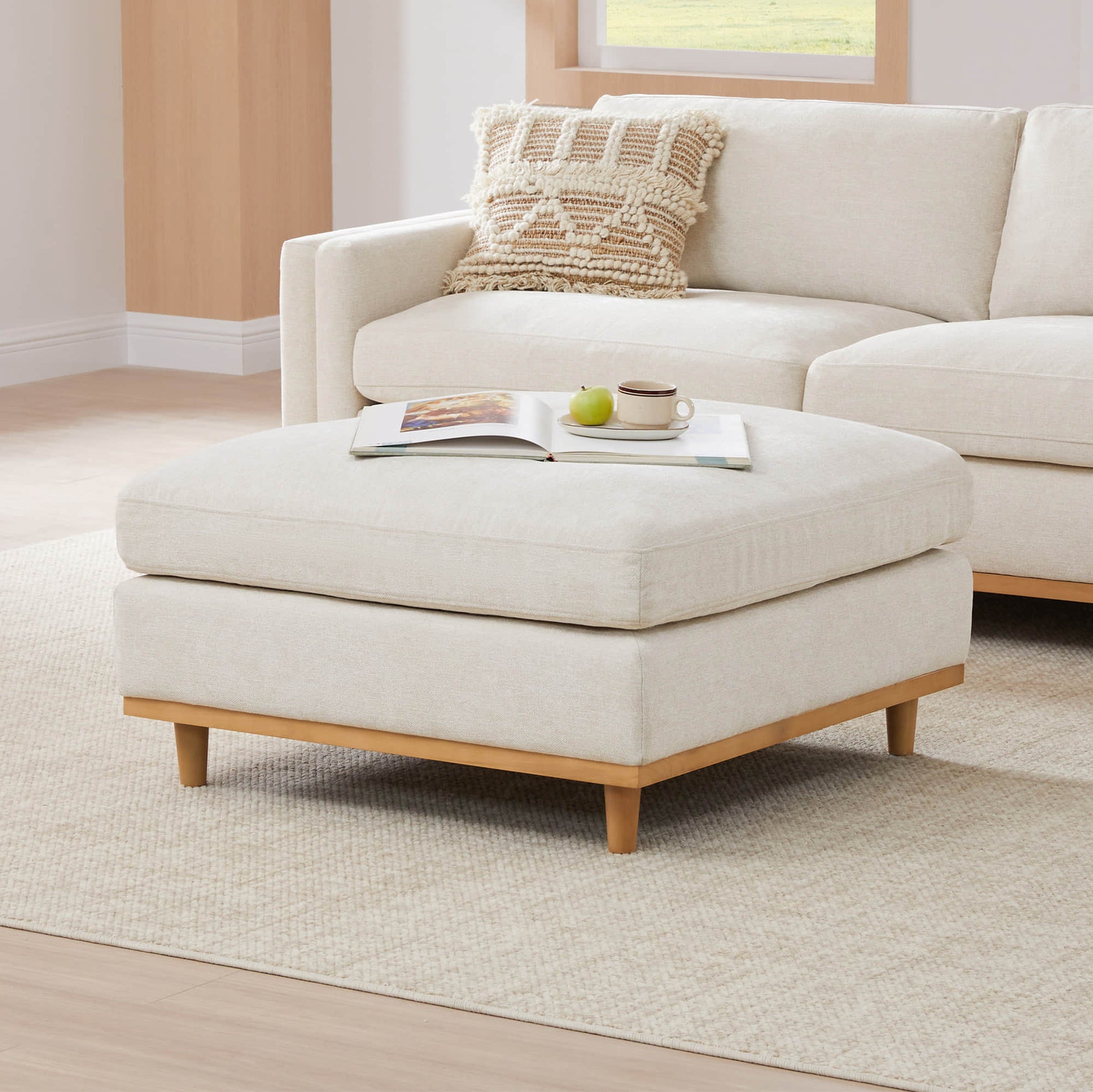 Liam modular ottoman in light fabric, complementing modern sectional sofa - CHITA Living