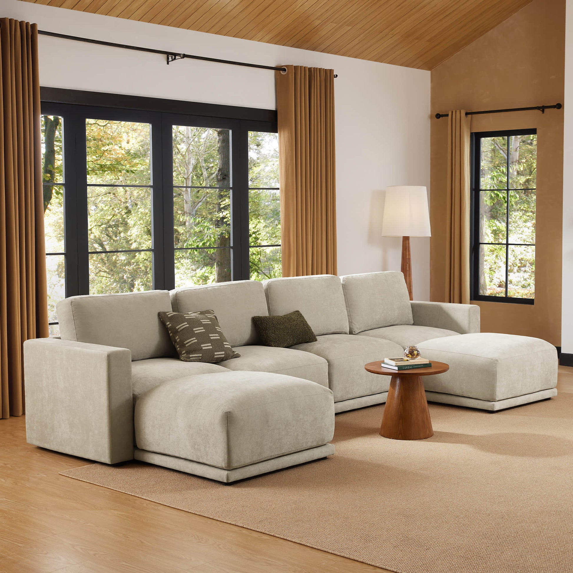 Stylish modular sofa sectional with durable fabric and chaise lounge.