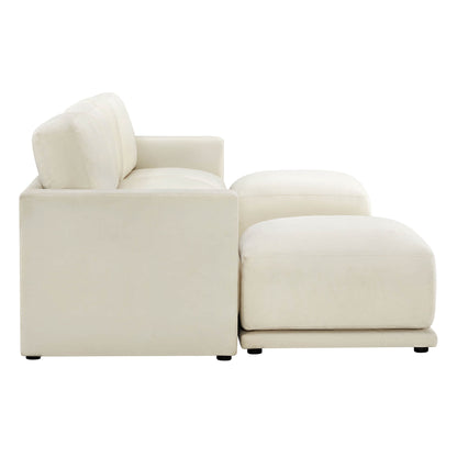 Side view of a modern white sectional sofa with a chaise lounge on one end.