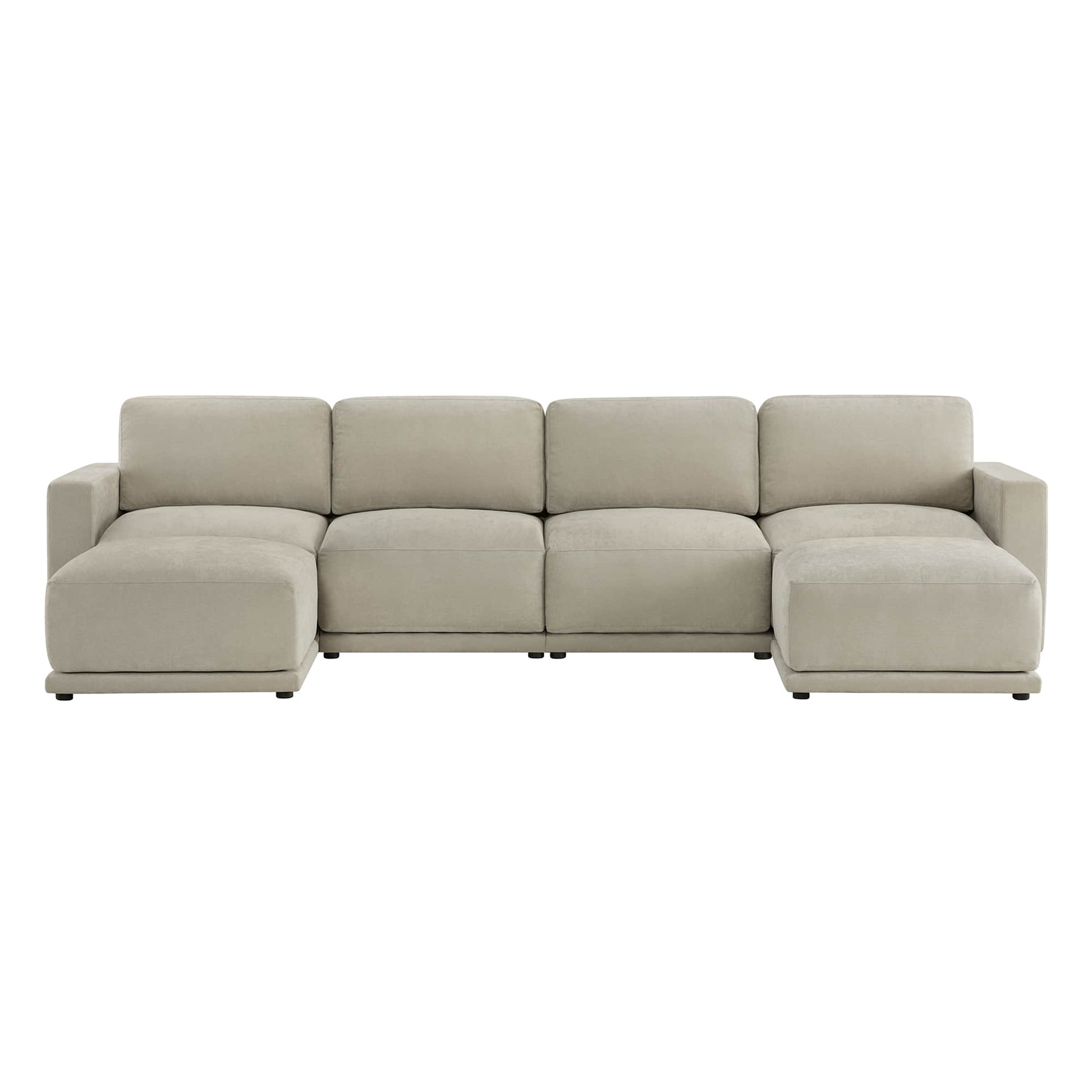 A beige sectional sofa with a modern design, featuring wide seats and low backrests, arranged in an L-shape.