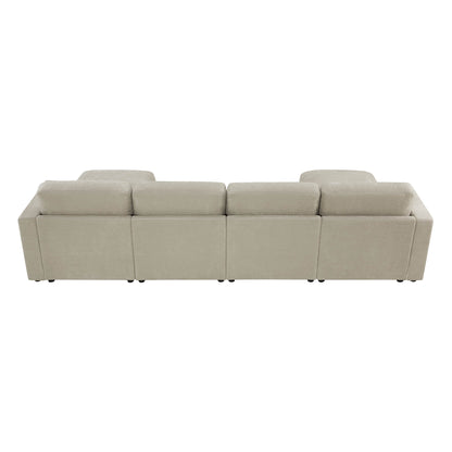 Rear view of a beige modular sofa sectional with three connected seats.