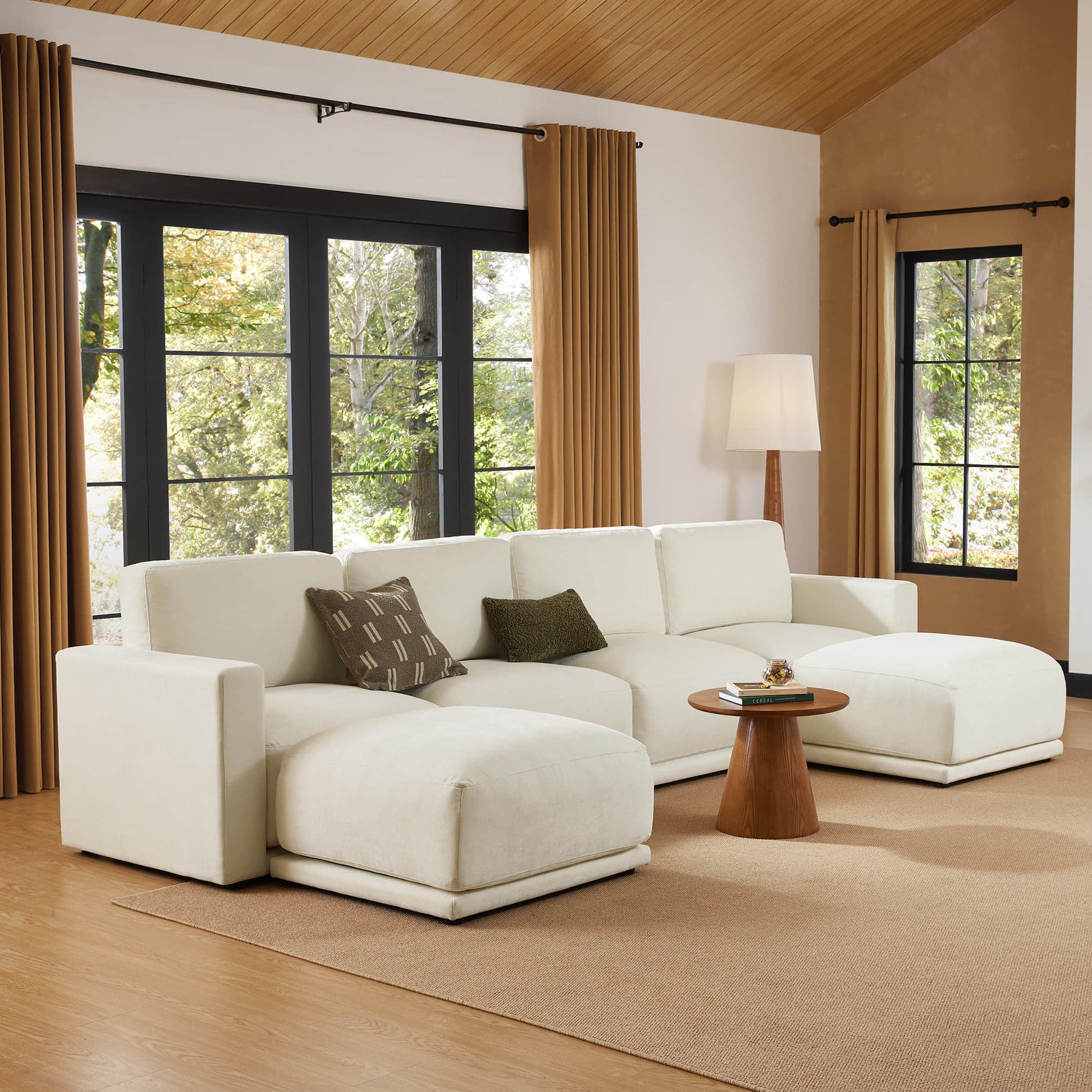 Elegant chaise sectional sofa in a bright, modern living space.