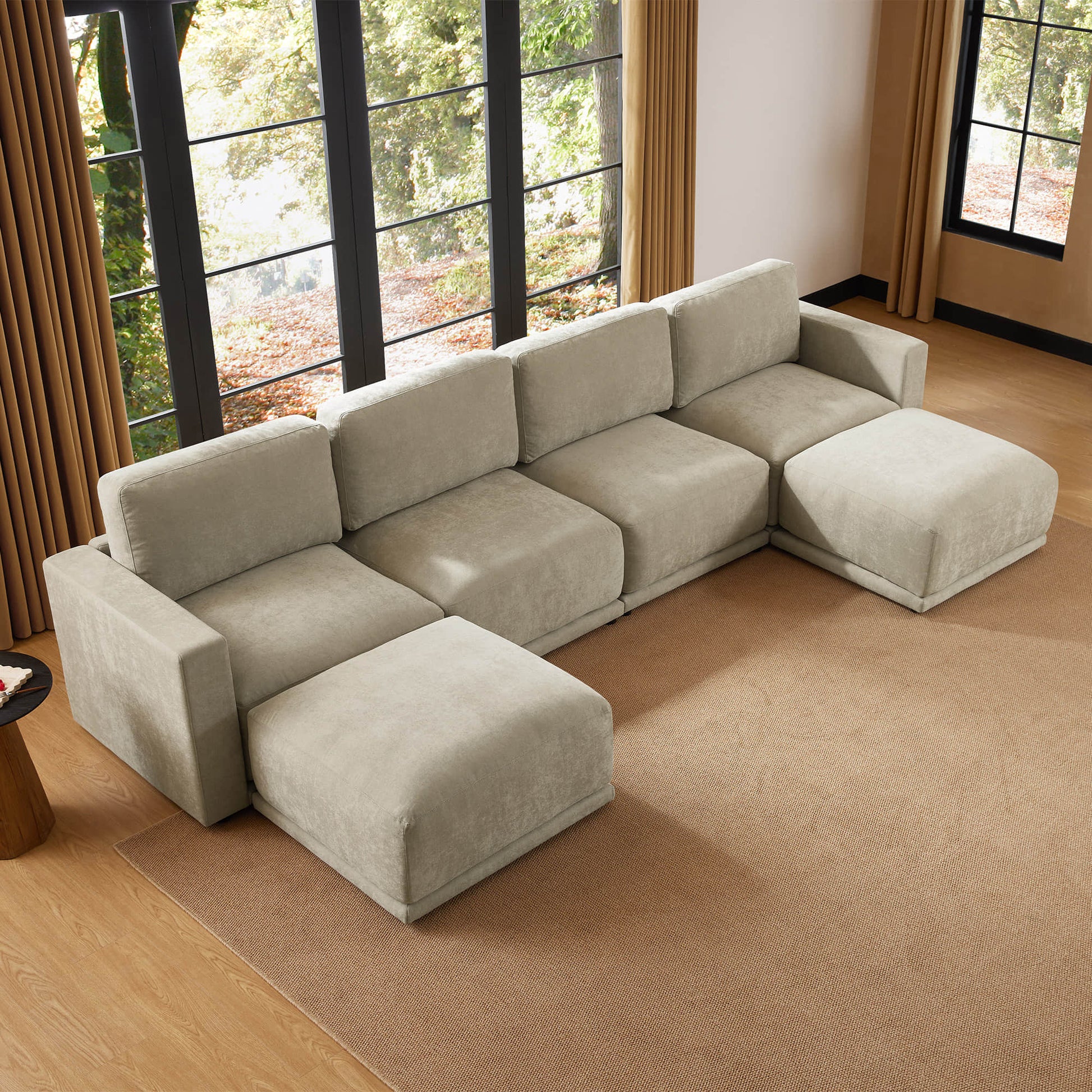 Modern modular sofa sectional with durable fabric and chaise setup.