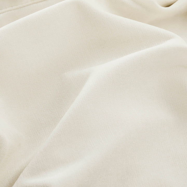 Close-up of fabric texture on modular sofa sectional.