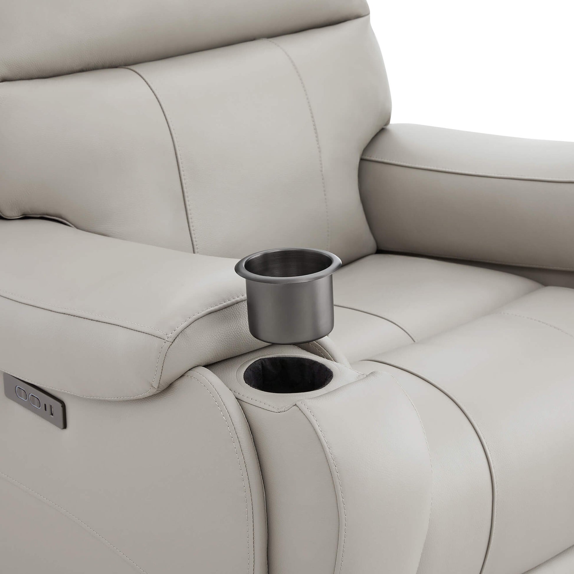 Close-up of Noah leather recliner armrest with integrated cup holder and plush leather - CHITA Living