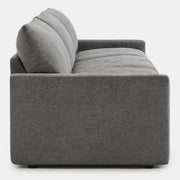 Side view of Ohana 3-Seat Motion Modular Sofa in grey with soft cushions - CHITA Living