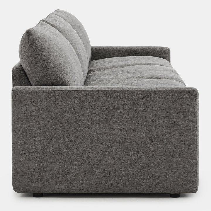 Side view of Ohana 3-Seat Motion Modular Sofa in grey with soft cushions - CHITA Living