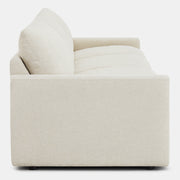 Side view of Ohana 3-Seat Motion Modular Sofa in light beige, emphasizing plush cushions - CHITA Living