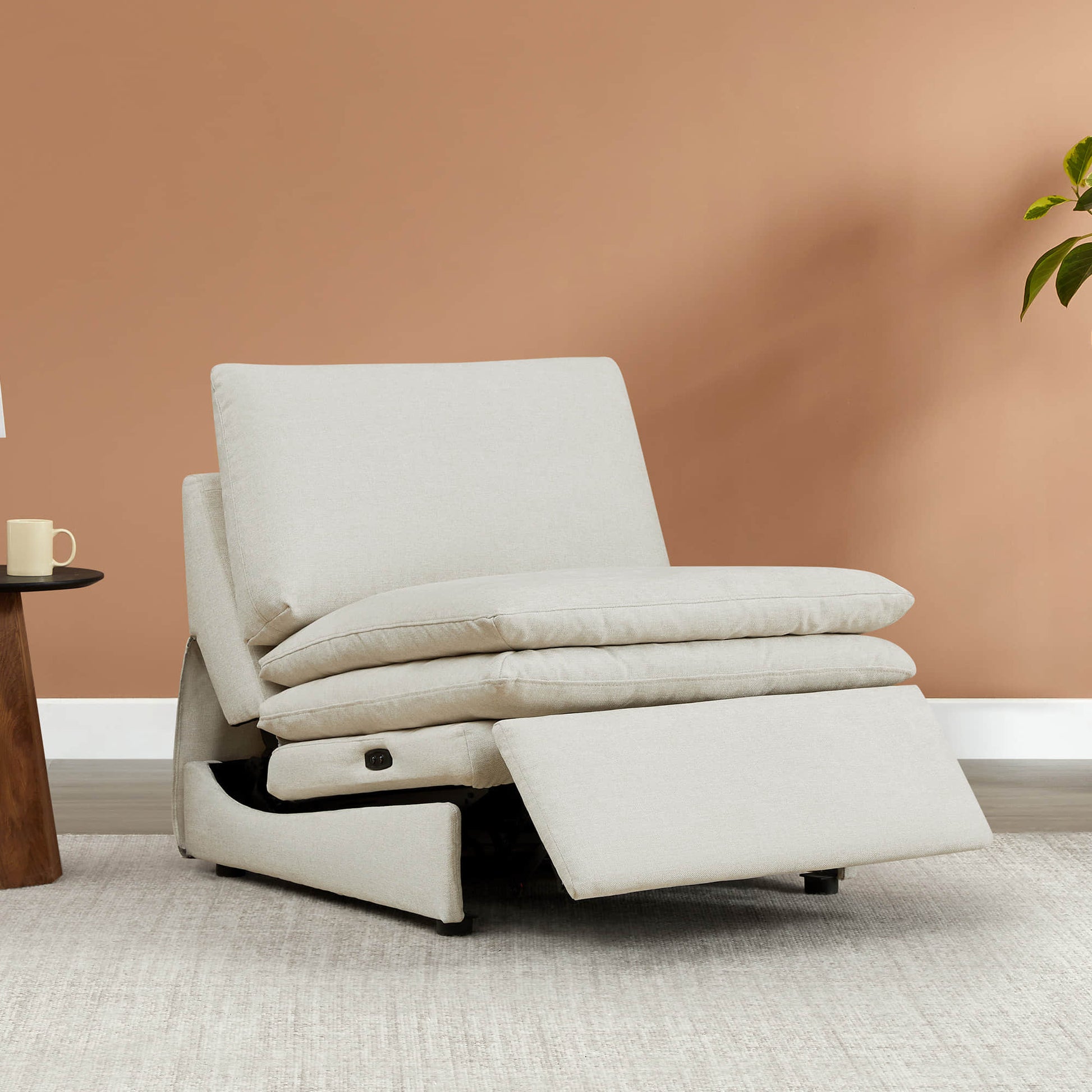 Cream armless recliner with plush cushions, extended footrest, and modern design - CHITA Living