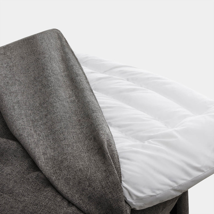 Close-up of Ohana Modular Sofa's soft, reversible cushion with grey fabric covering - CHITA Living